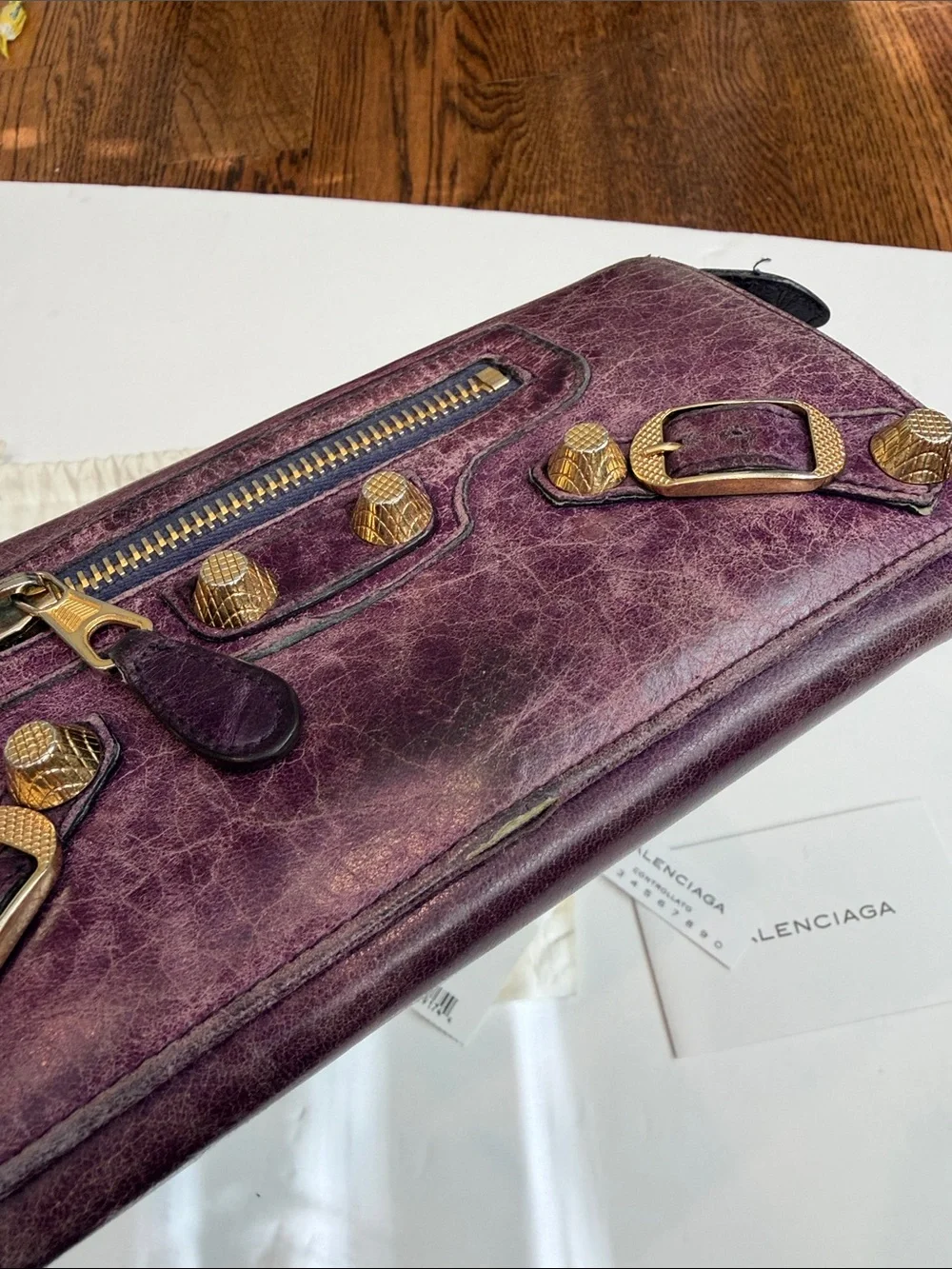 Balenciaga Distressed Plum Leather Continental Wallet with Gold Hardware